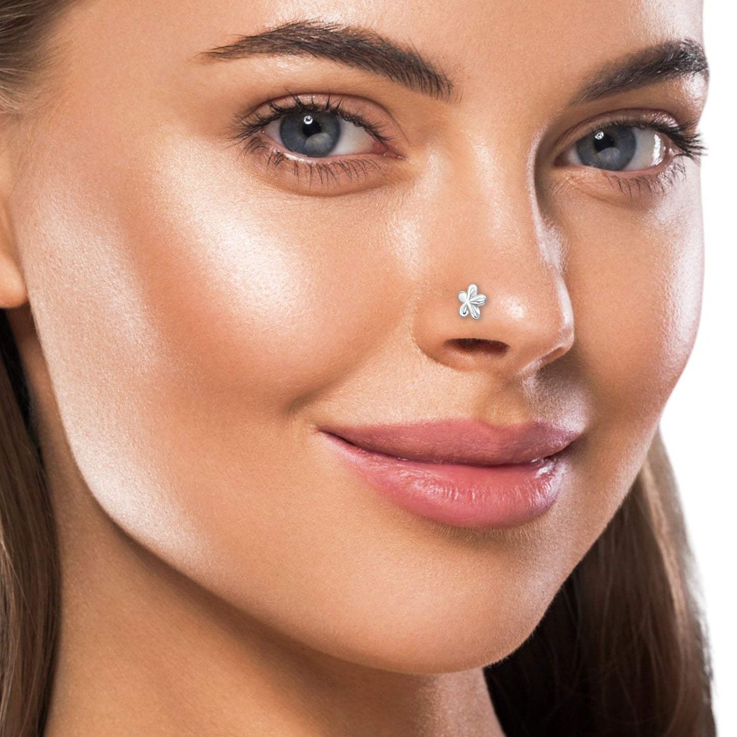 Sterling silver flower nose stud in 22G, designed for a delicate and stylish nose piercing.