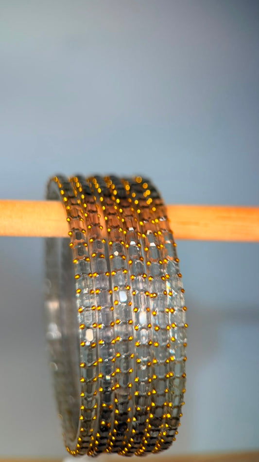Smoky grey Navrang Sparkle Glass Bangles set by Belumiee, featuring shimmering glass bangles with a smoky grey finish.