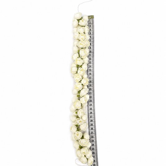 Double-layer artificial jasmine hair garland beside a metric tape showing its approximate 40 cm length