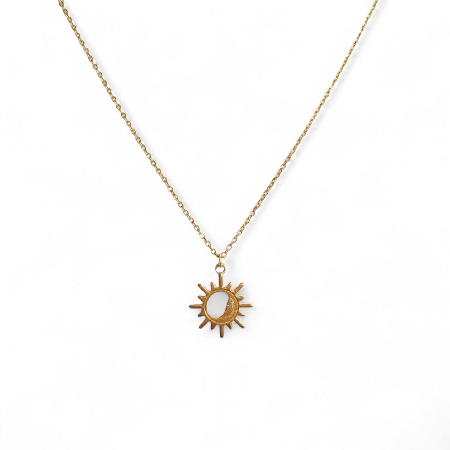 Sterling silver sun pendant necklace by Belumiee, featuring a detailed sun design on a delicate chain in silver and gold tones.