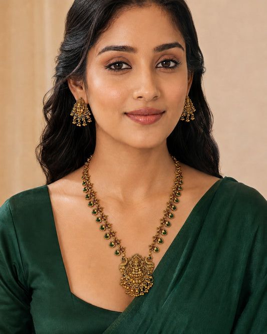 Traditional Lakshmi Green Palakka Temple Necklace Set by Belumiee, featuring intricate green and gold jewelry with temple design.