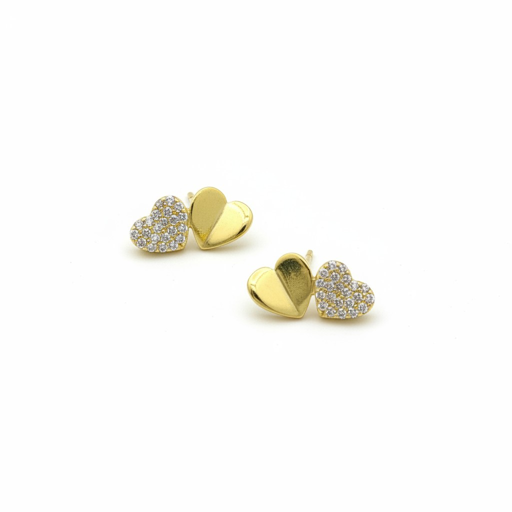 Sterling silver dual heart stud earrings by Belumiee featuring two small heart-shaped designs on each earring.