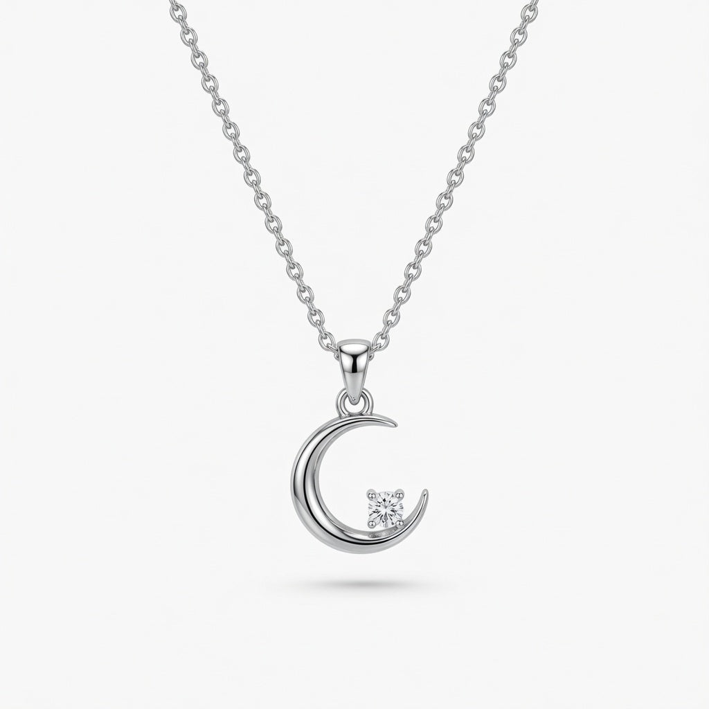Sterling silver moon and star pendant necklace by Belumiee, featuring a delicate moon and star charm on a sleek chain.