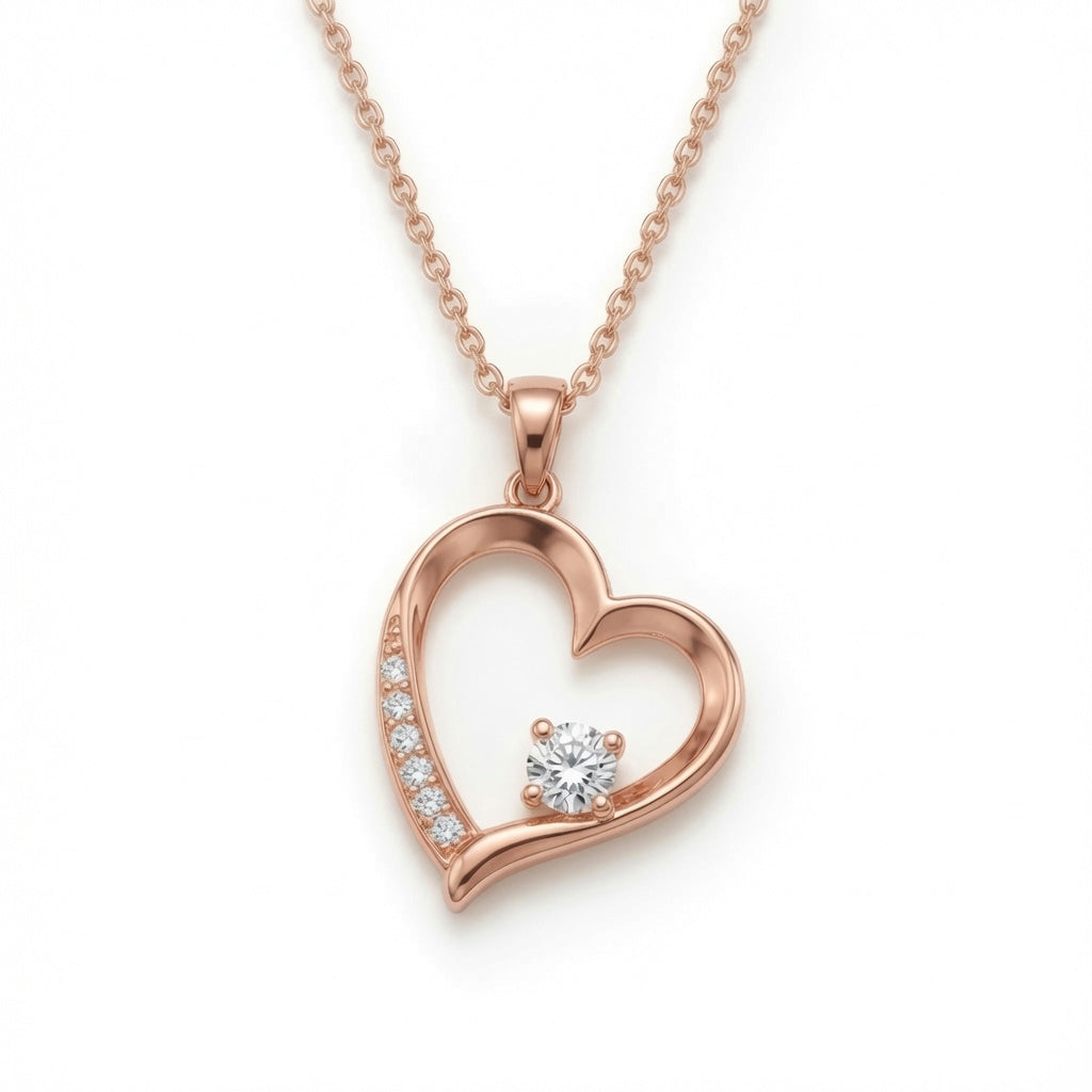 Sterling silver heart pendant necklace by Belumiee, featuring a delicate design, on a plain background.