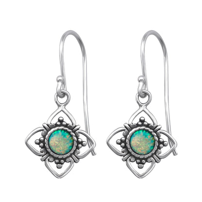 Silver flower earrings with synthetic opal accents, crafted from 925 sterling silver, featuring a delicate floral design.