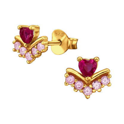 Heart-shaped sterling silver ear studs with pink gemstone accents, designed by Belumiee for elegant everyday wear.