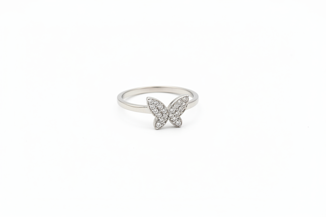 Sterling silver butterfly design ring by Belumiee featuring intricate butterfly motifs on a polished band.