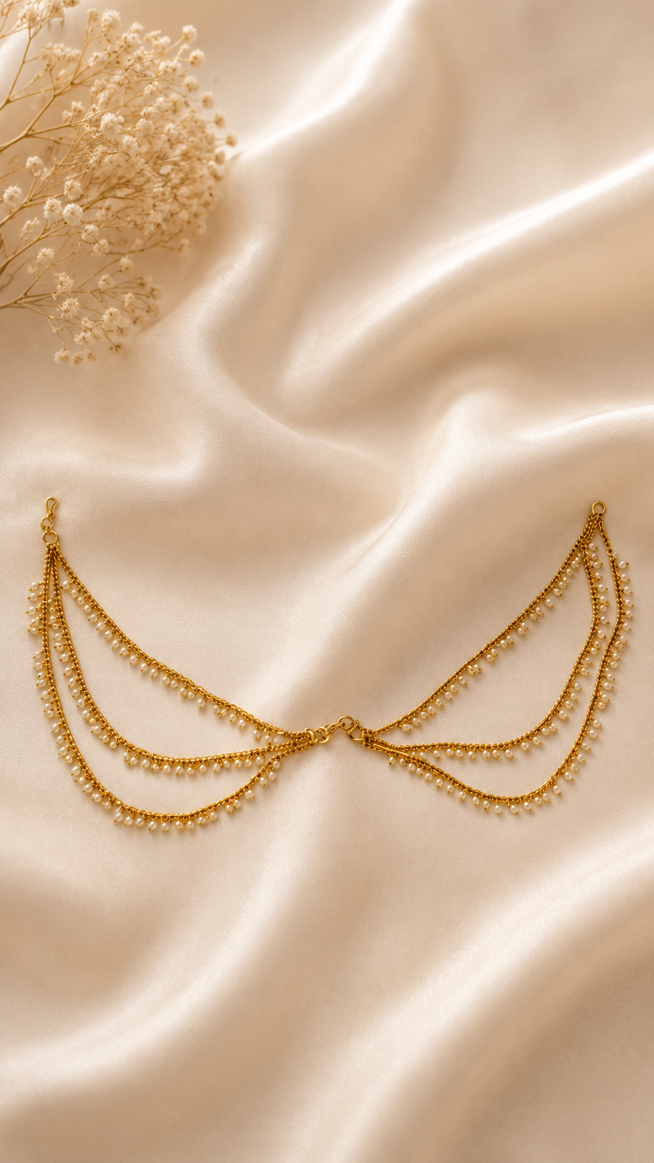 Elegant pearl layered ear chain by Belumiee, featuring delicate pearl strands and a stylish ear jewelry design.