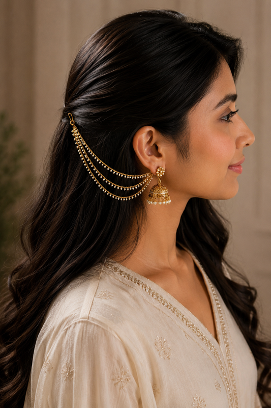 Elegant pearl layered ear chain by Belumiee featuring multiple pearl-adorned chains for a stylish ear jewelry look.