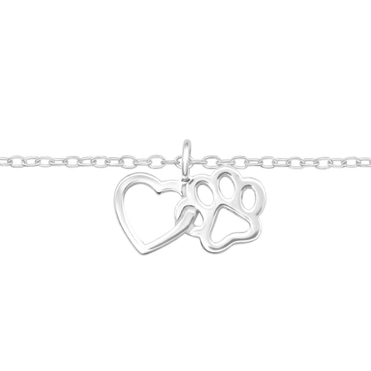 Sterling silver Heart & Paw bracelet by Belumiee featuring a delicate design and adjustable chain on a neutral background.