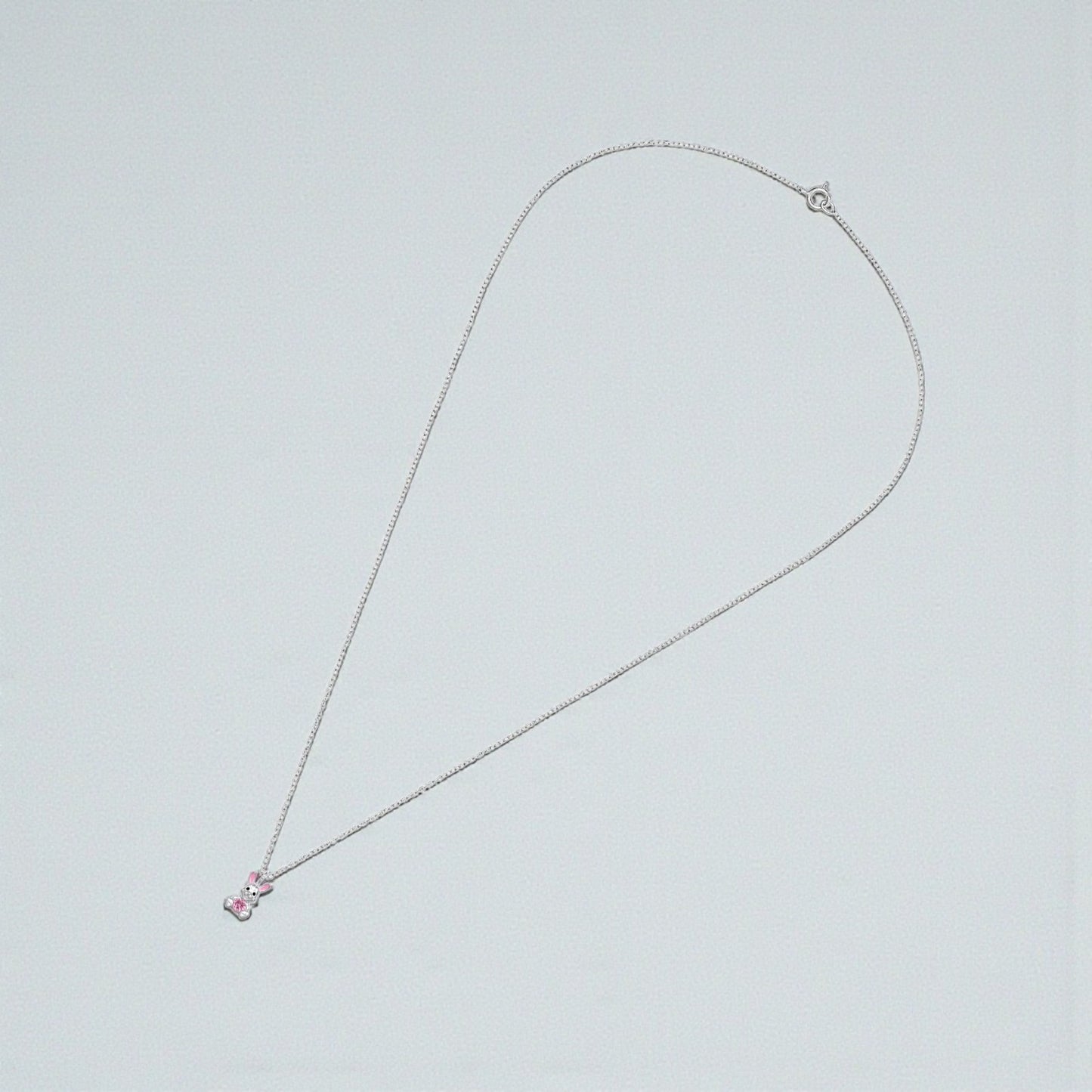 Kids rabbit necklace in 925 sterling silver featuring a cute pink rabbit pendant, designed for children by Belumiee.