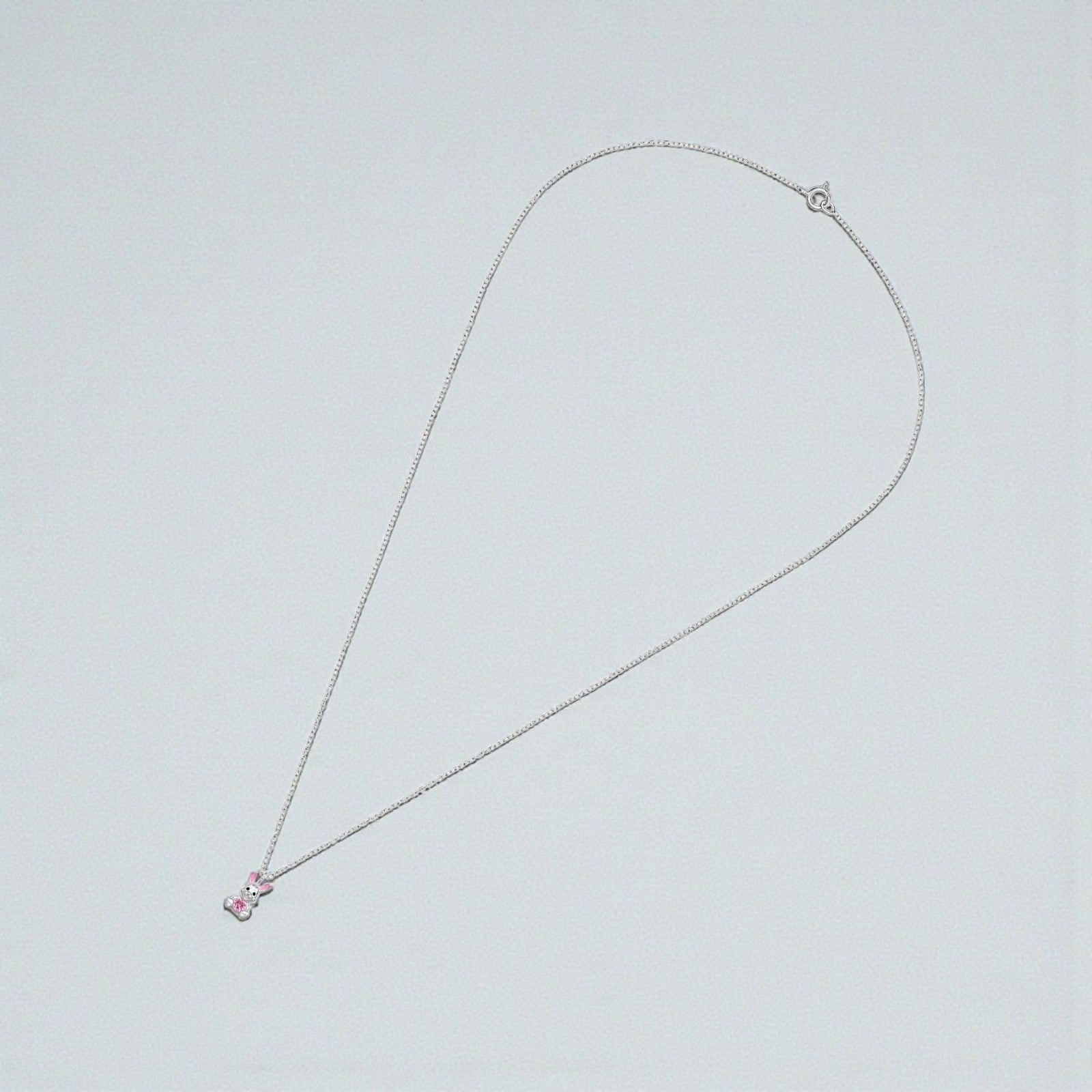 Kids rabbit necklace in 925 sterling silver featuring a cute pink rabbit pendant, designed for children by Belumiee.