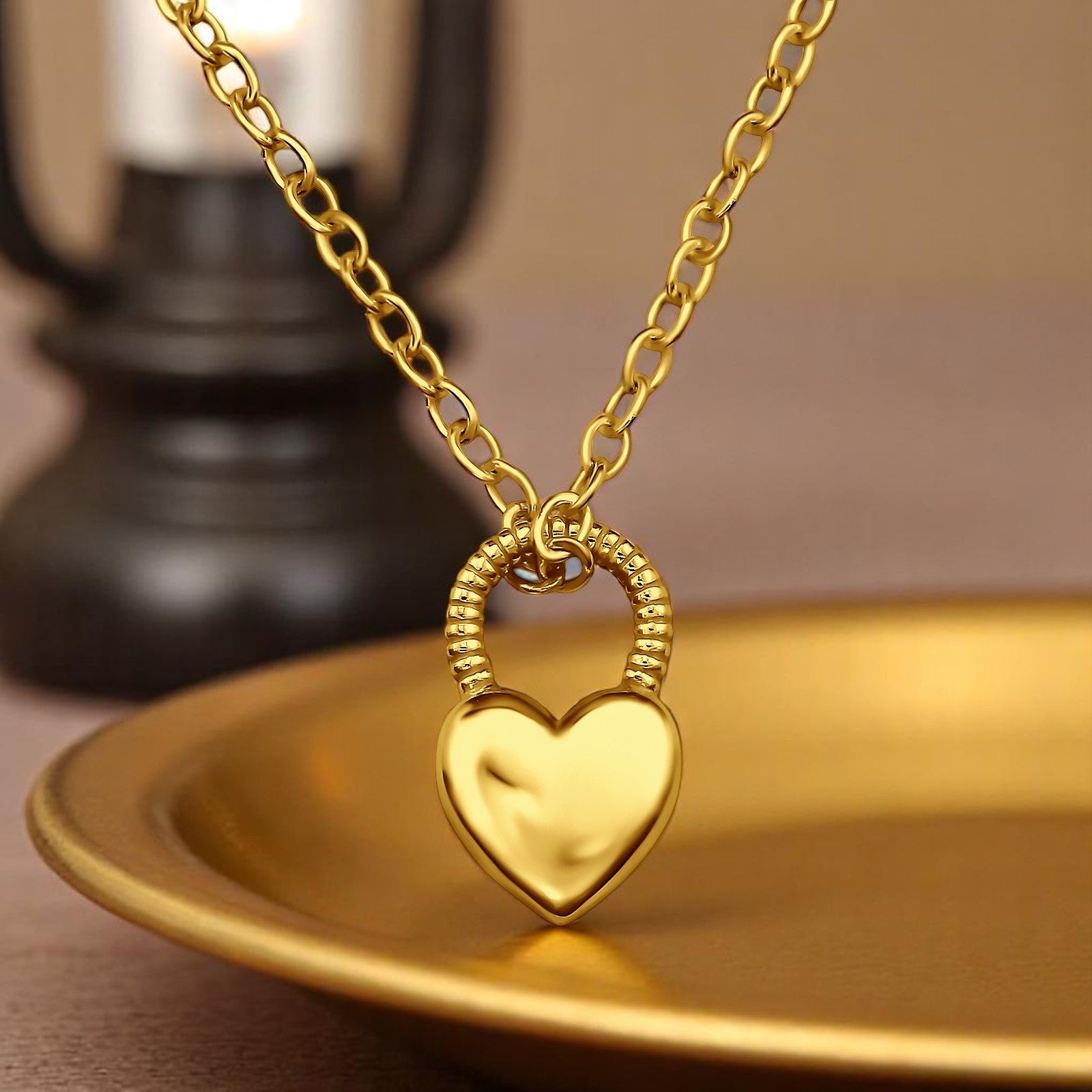 Gold plated heart padlock necklace in 925 sterling silver, featuring a delicate chain and secure clasp.