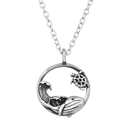 Sterling silver whale, sea turtle, and wave necklace by Belumiee, featuring detailed ocean-themed pendant on a 45cm chain