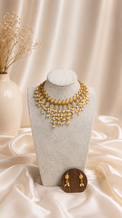 Gold pearl layered traditional necklace and earrings set by Belumiee, featuring intricate gold design and elegant pearl accents.