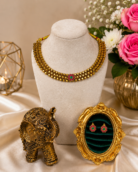 Traditional Kemp stone beaded necklace set with intricate design, featuring multiple strands and vibrant bead accents.