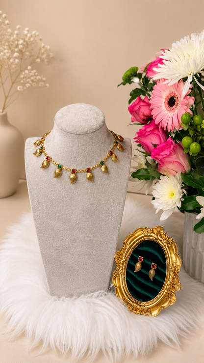 Traditional manga leaf drop necklace set by Belumiee, featuring intricate leaf pendant jewelry with matching earrings.