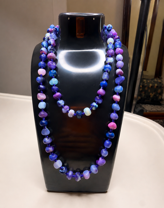 Multi-strand beaded stone necklace by Belumiee, featuring colorful stones and contemporary jewelry design.