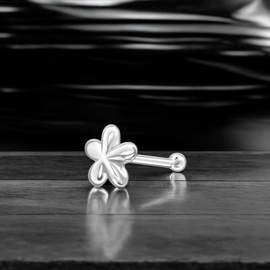 Sterling silver flower nose stud in 22G with a delicate floral design, ideal for nose piercings and fine jewelry.