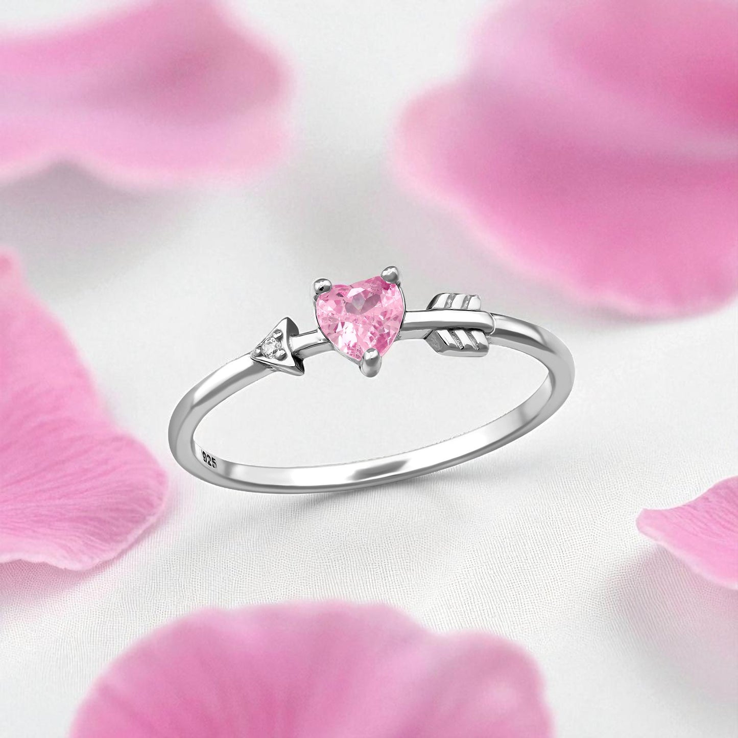 Sterling silver Heart & Arrow ring by Belumiee, featuring a pink and white design with intricate heart and arrow details.