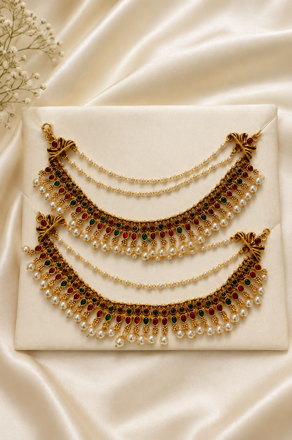 Elegant pearl ear chain by Belumiee featuring a royal temple design, displayed on a white background with intricate details.