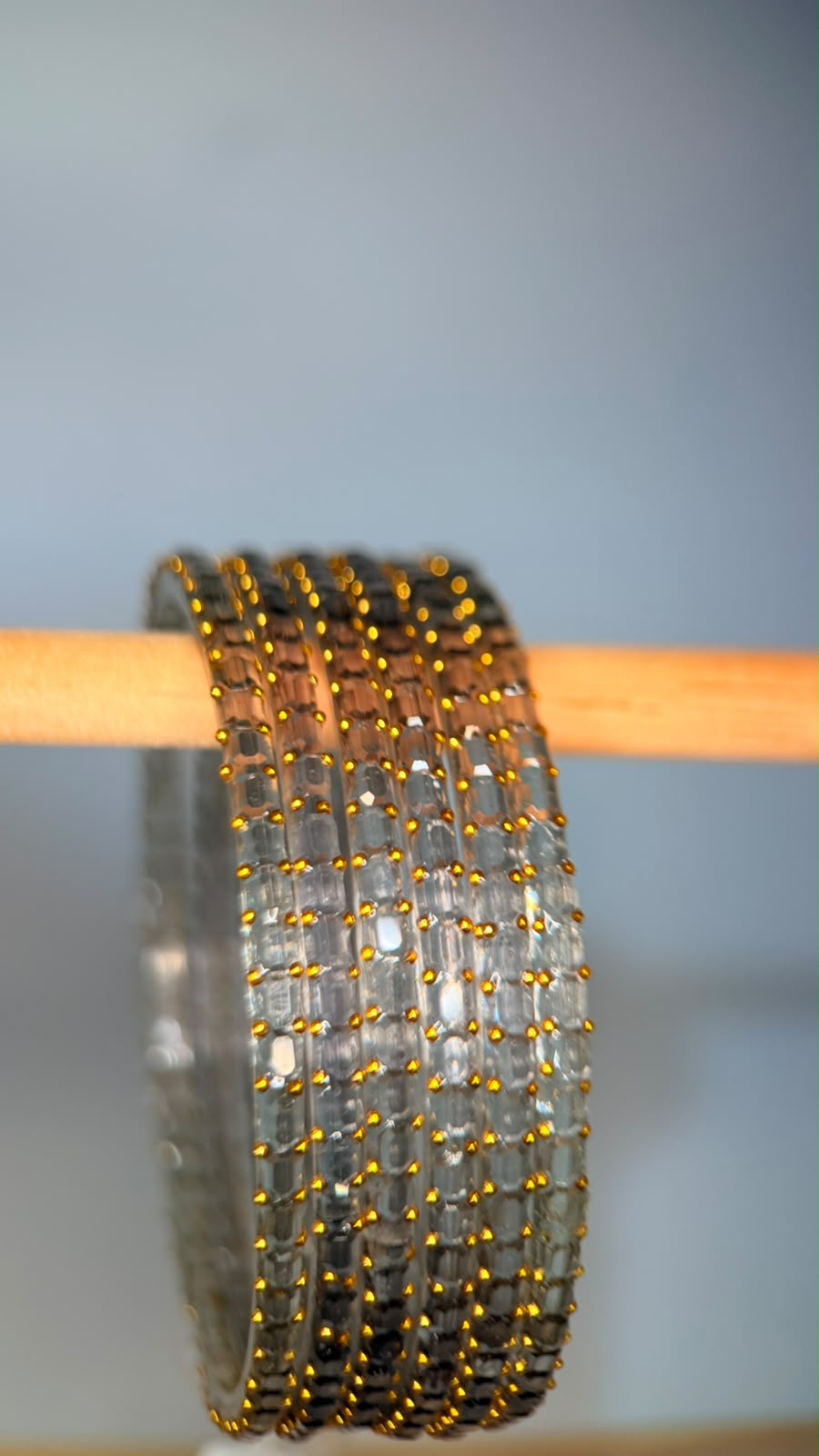 Smoky grey Navrang Sparkle Glass Bangles set by Belumiee, featuring shimmering glass bangles with a smoky grey finish.