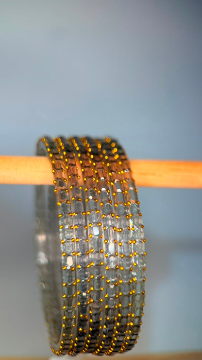 Smoky grey Navrang Sparkle Glass Bangles set by Belumiee, featuring shimmering glass bangles with a smoky grey finish.