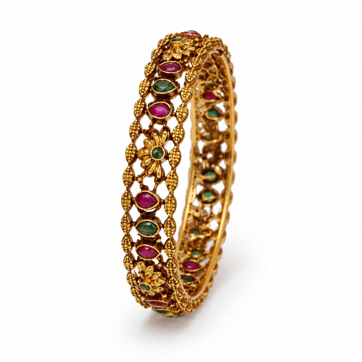 Antique gold-tone floral lattice bangle with ruby pink and emerald green stones, size 2.6