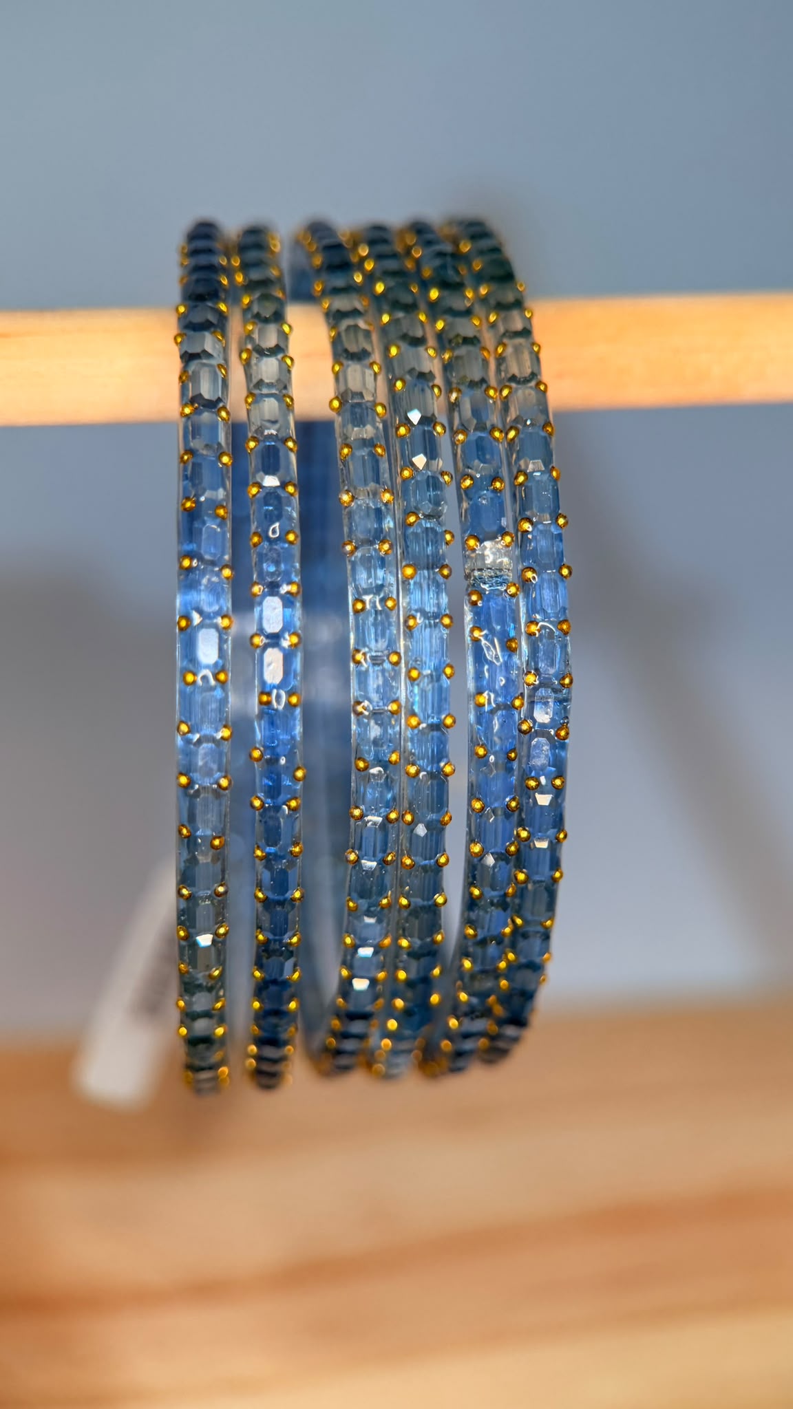 Baby blue Navrang Sparkle glass bangles set by Belumiee, featuring shiny, decorative bangles perfect for traditional or festive wear.
