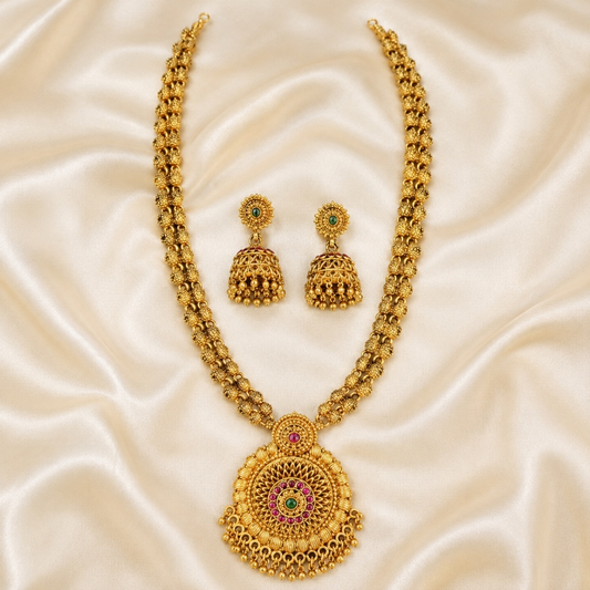 Antique gold temple pendant long necklace and jhumka set by Belumiee, featuring intricate designs and traditional jewelry craftsmanship.