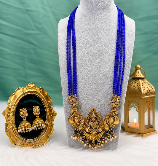 Blue bead Lakshmi temple long haram necklace and jhumka set featuring intricate design, traditional Indian jewelry by Belumiee.