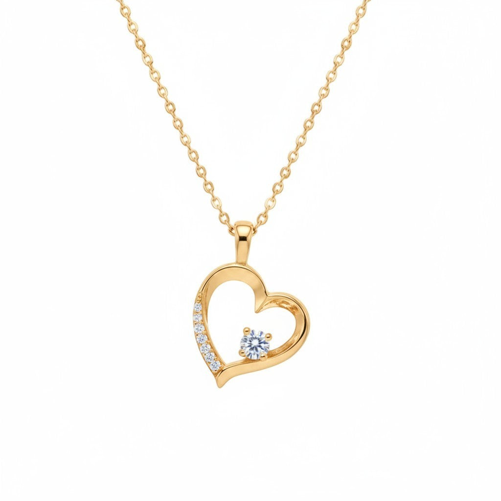 Belumiee gold-plated sterling silver heart pendant necklace with sparkling CZ stones on a delicate chain.