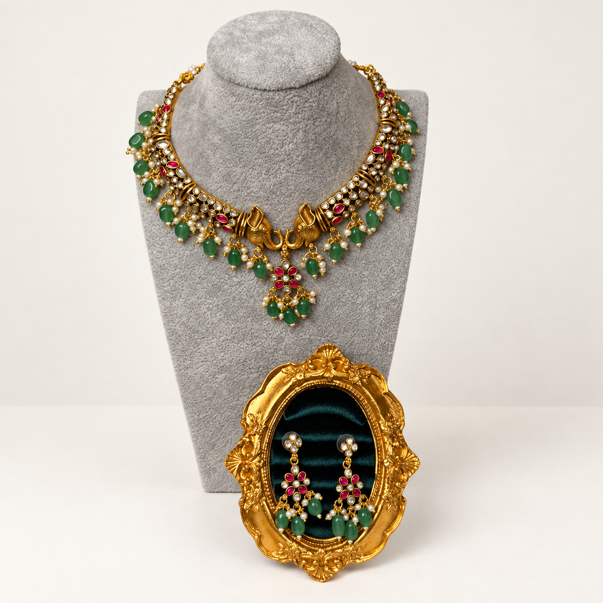 AI-edited warm-white studio presentation of the green bead elephant necklace and earrings set; product detail review required.