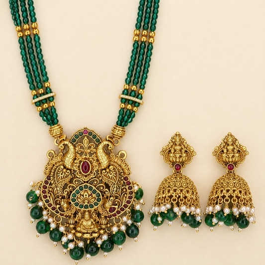 Emerald green beaded temple pendant and jhumka set from Belumiee, featuring a long Haram necklace with intricate beadwork.