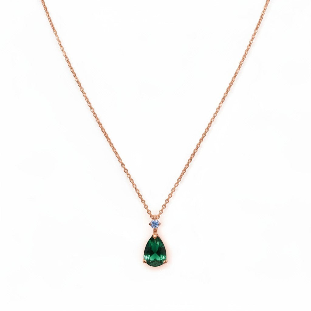 Belumiee teardrop pendant necklace in rose gold with a green CZ stone and delicate sparkle detail on a silver chain.