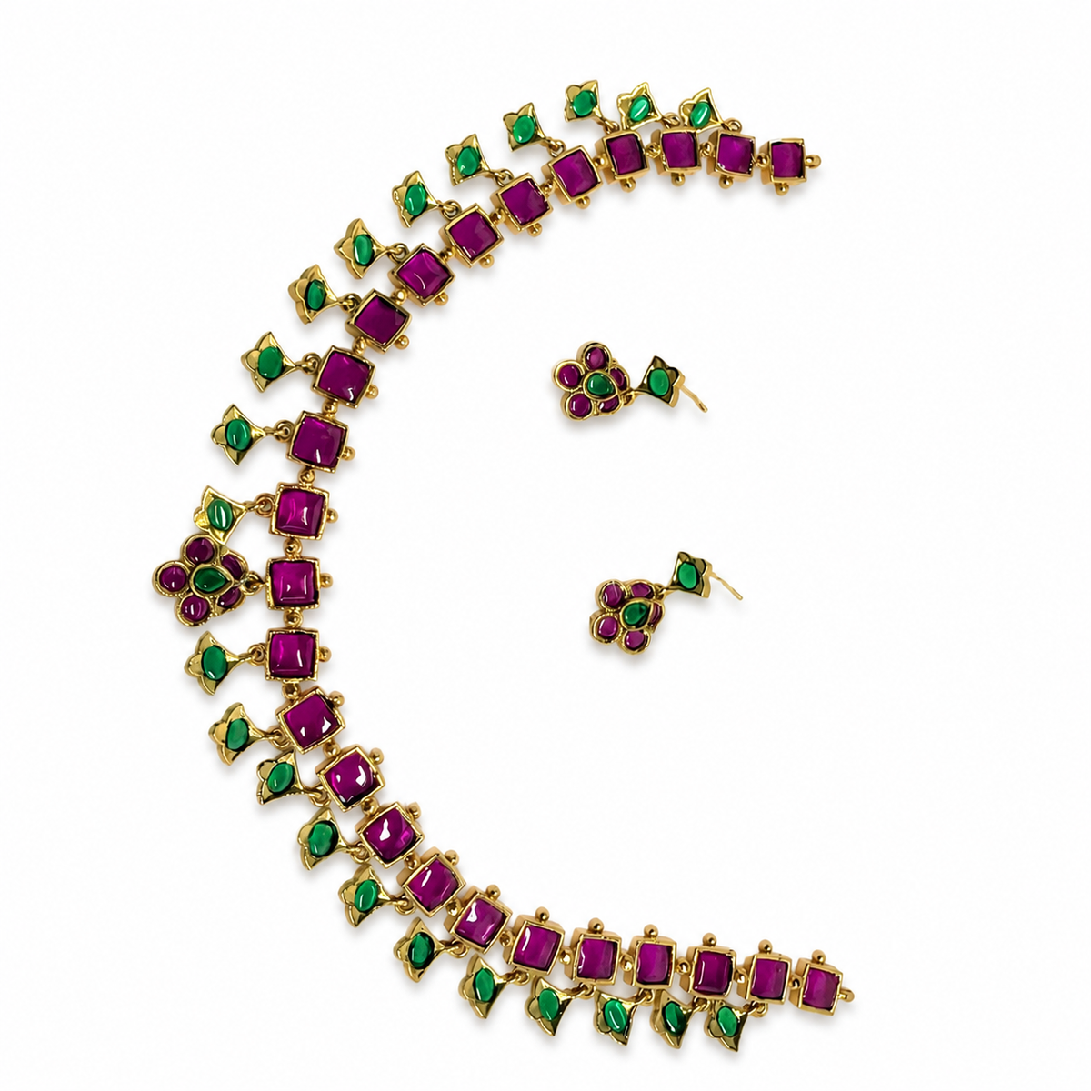 Belumiee gold-tone necklace and earrings set with ruby-pink square stones and emerald-green leaf drops on white