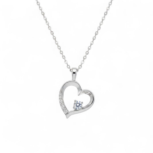 Belumiee sterling silver heart pendant necklace with a sparkling CZ stone and delicate chain on a white background.
