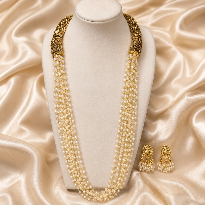 Antique gold and ivory multi-strand pearl-style long Haram necklace set with satin finish from Belumiee.