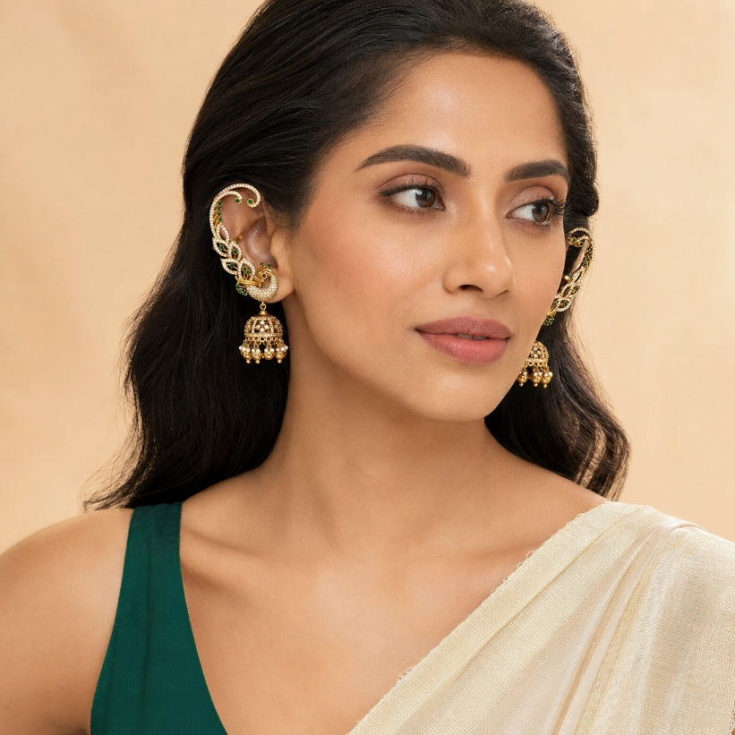 Model wearing emerald green peacock ear cuff jhumka earrings