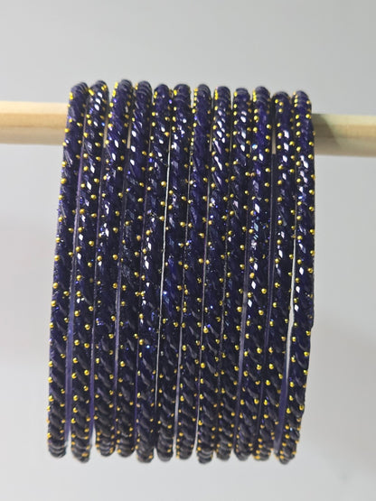 Montana indigo Ratna twisted glass bangles with gold-dot detailing