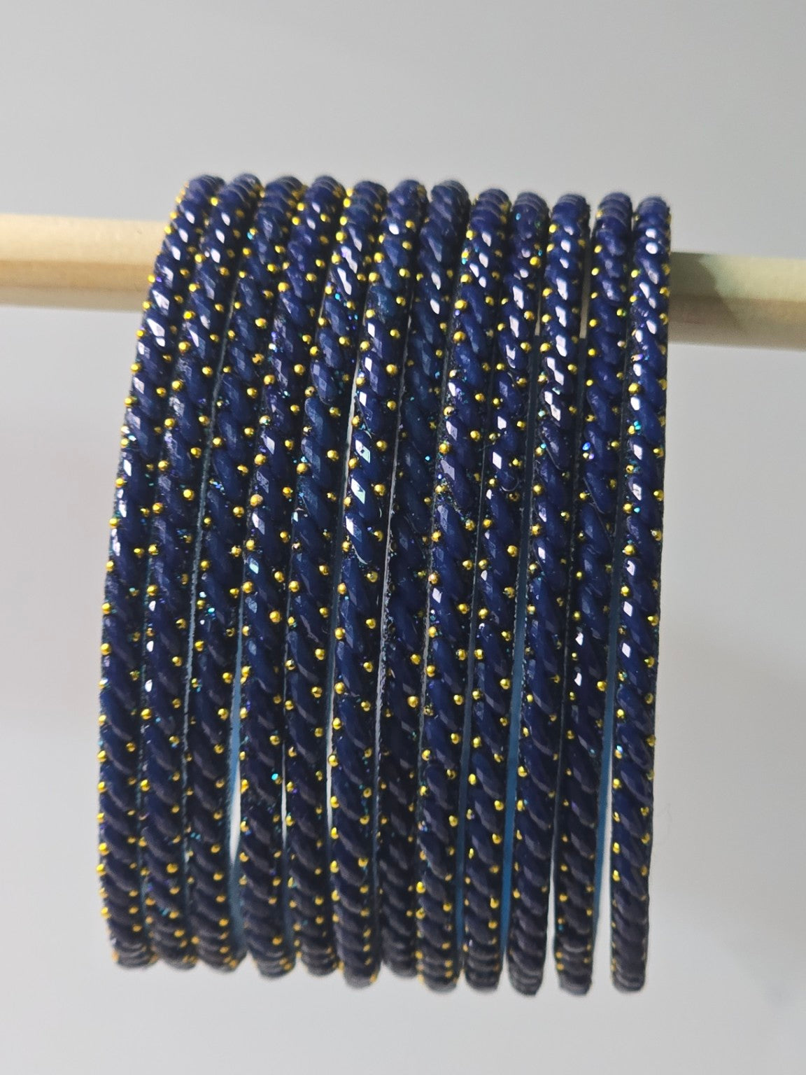 Peacock Green Ratna twisted glass bangles with gold-dot detailing