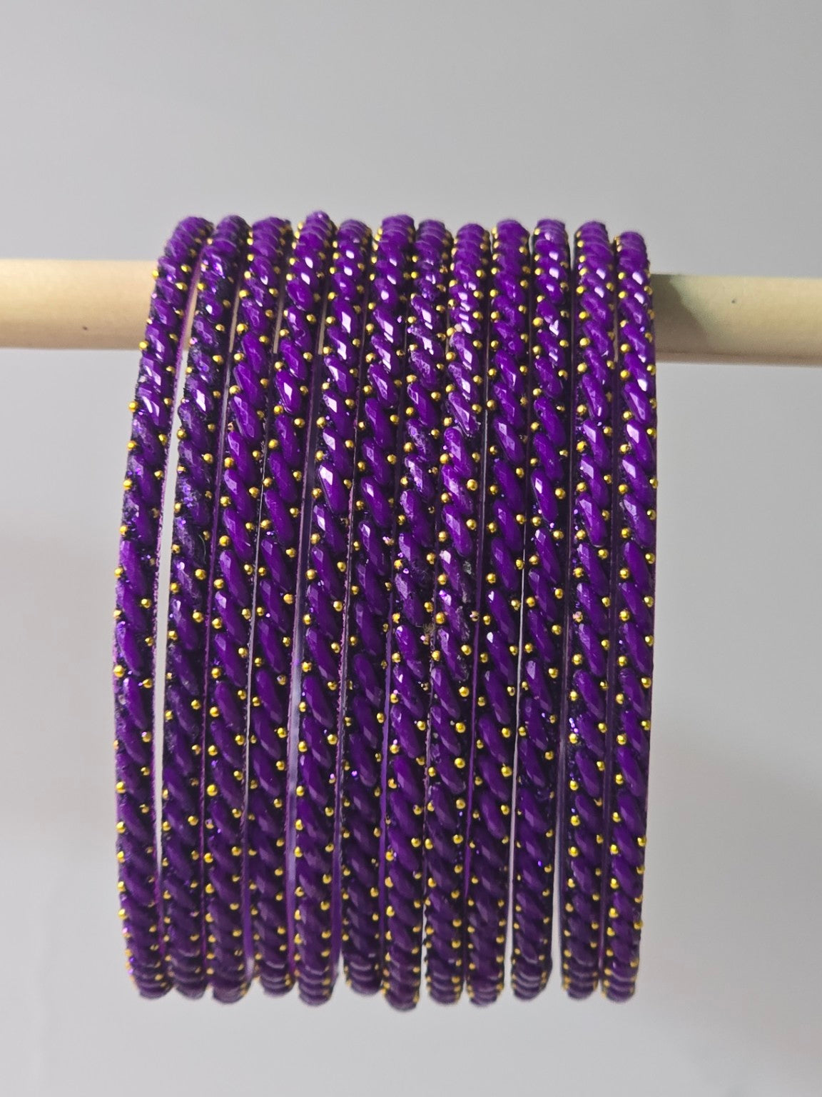 Plum purple Ratna twisted glass bangles with gold-dot detailing