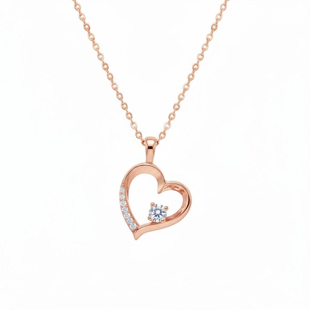 Belumiee rose gold heart pendant necklace in 925 sterling silver with sparkling CZ stone accents on a delicate chain.