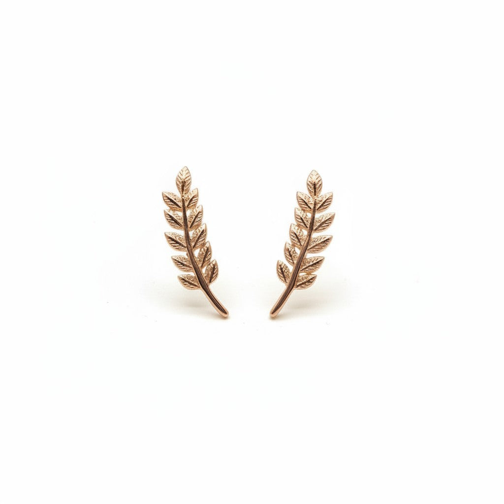 Belumiee rose gold leaf ear crawler stud earrings made of 925 sterling silver with a gold-plated finish.