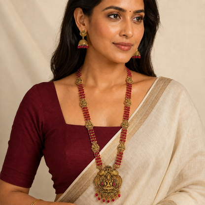 Ruby beaded Lakshmi temple long necklace and jhumka set by Belumiee featuring intricate design and traditional jewelry style.