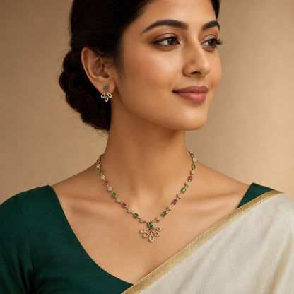 Model wearing ruby and emerald floral teardrop American Diamond necklace and earrings