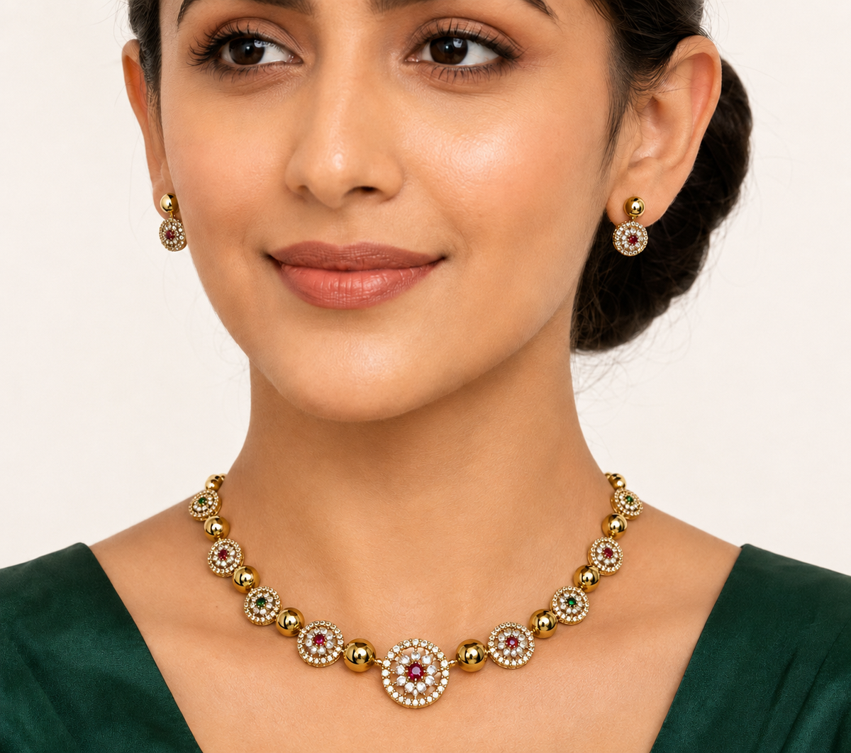 Model wearing ruby and emerald halo American Diamond necklace and earrings