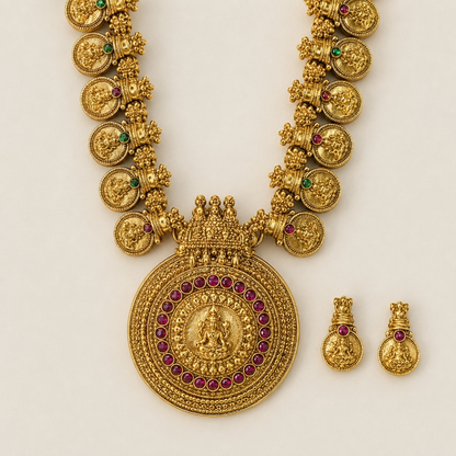 Antique gold temple coin long necklace and earrings set with intricate detailing, traditional Indian jewelry by Belumiee.