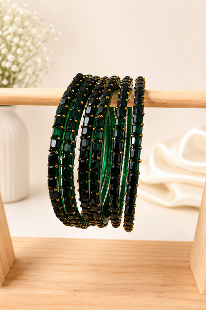 Belumiee Navrang Sparkle Glass Bangles Set in vibrant bottle green with shimmering glass design, perfect for traditional accessories