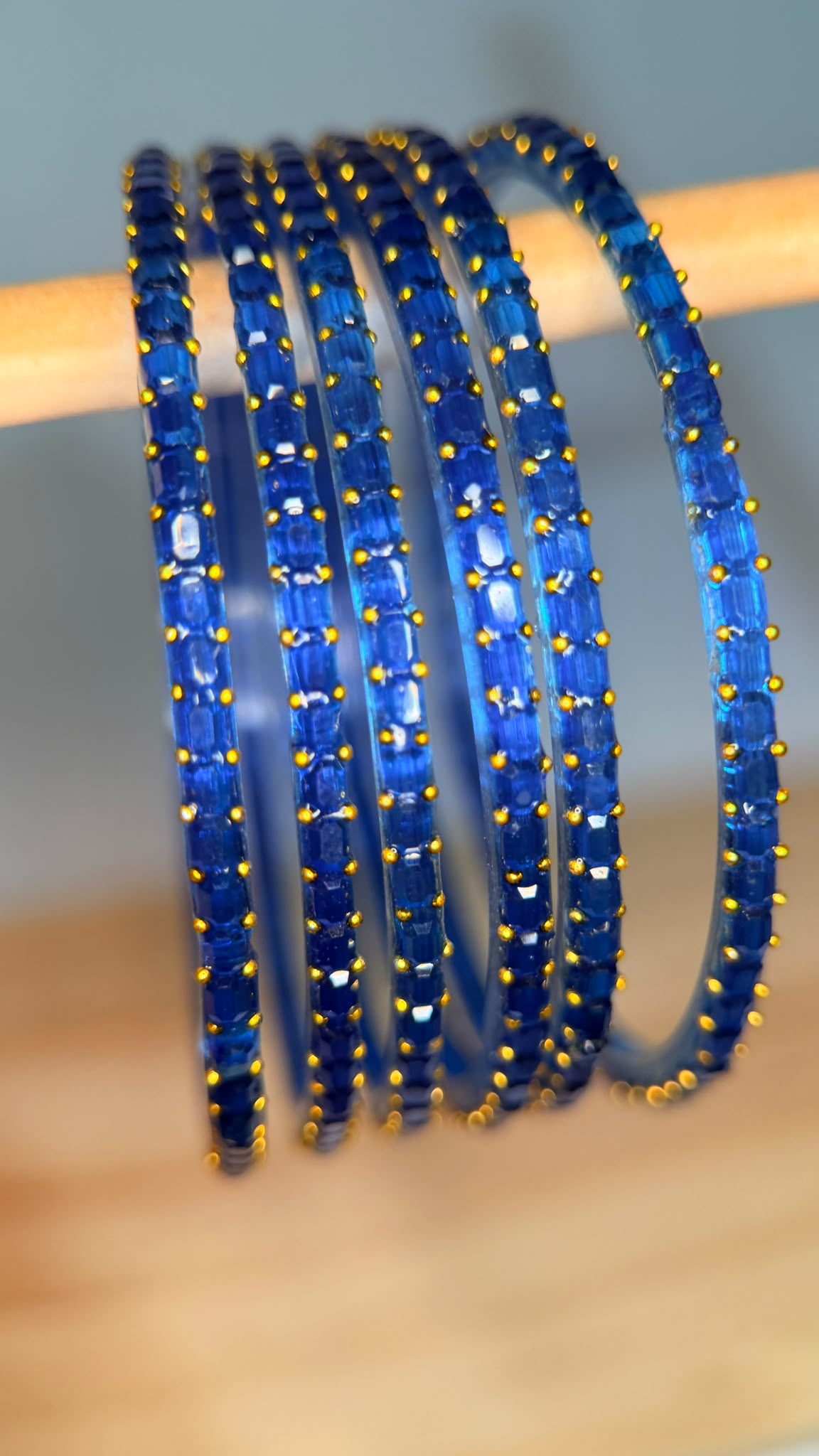 Electric blue Navrang Sparkle Glass Bangles Set by Belumiee, featuring shiny, decorative glass bangles for traditional or festive wear.